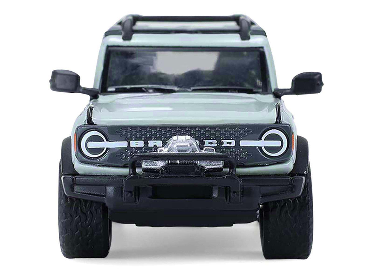 2021 Ford Bronco 4-Door Badlands Cactus Gray with Black Top and Motorcycle with Utility Trailer "Hitch & Tow" Series 33 1/64 Diecast Model Cars by Greenlight