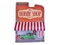 1946 Ford Fordor Super Deluxe Green Metallic with White Interior and Roof Rack with Surfboards "The Hobby Shop" Series 16 1/64 Diecast Model Car by Greenlight