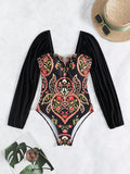 Long sleeved mesh one-piece swimsuit for women