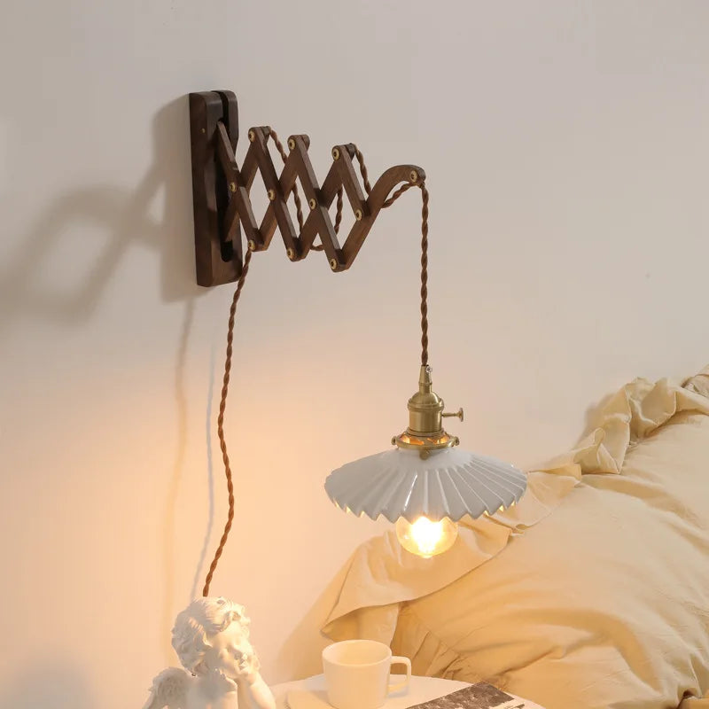 Antique brass ceramic walnut wall sconce with scalloped shade bedroom