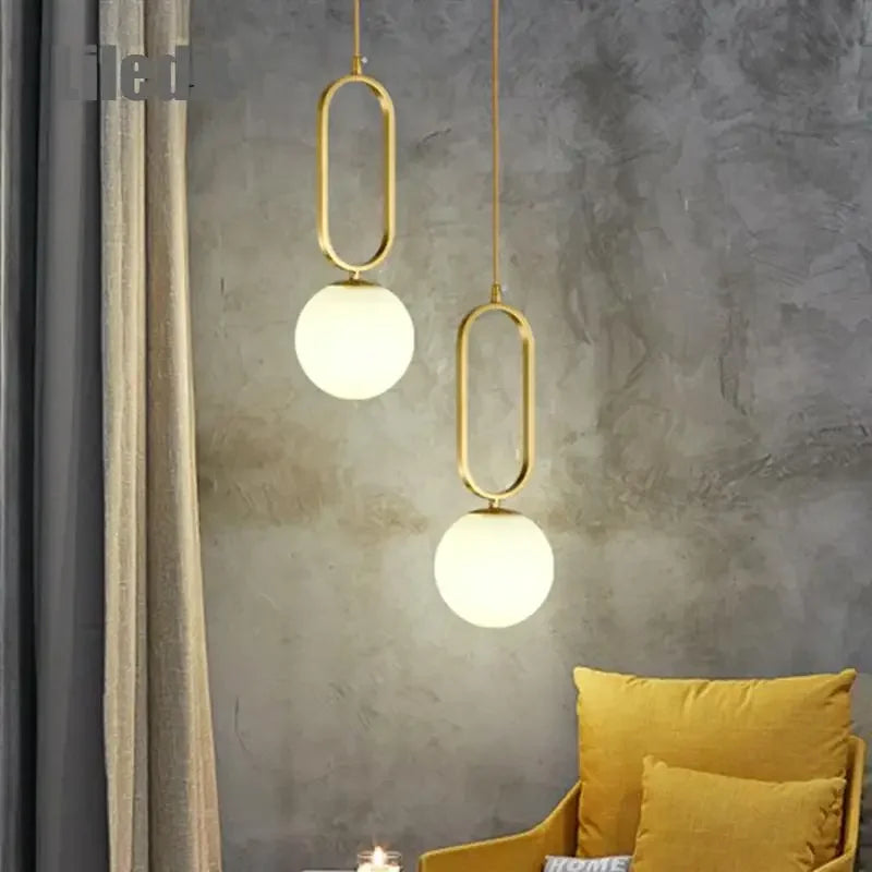 DecorBites™ Golden Glass Ball Pendant Lights - Modern Luminaire for Bedroom, Kitchen & Decor