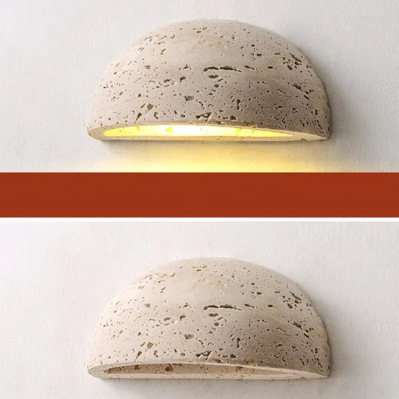Textured travertine wall light – porch warm yellow sconce