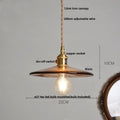 Amber glass pendant light with brass knob switch for dining room