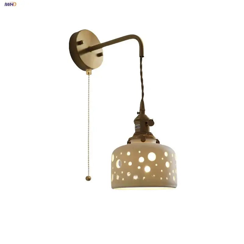 Antique brass ceramic led wall light bedroom sconce with cutouts