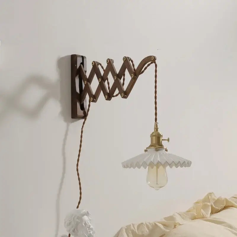 Antique brass ceramic walnut wall sconce with scalloped shade bedroom