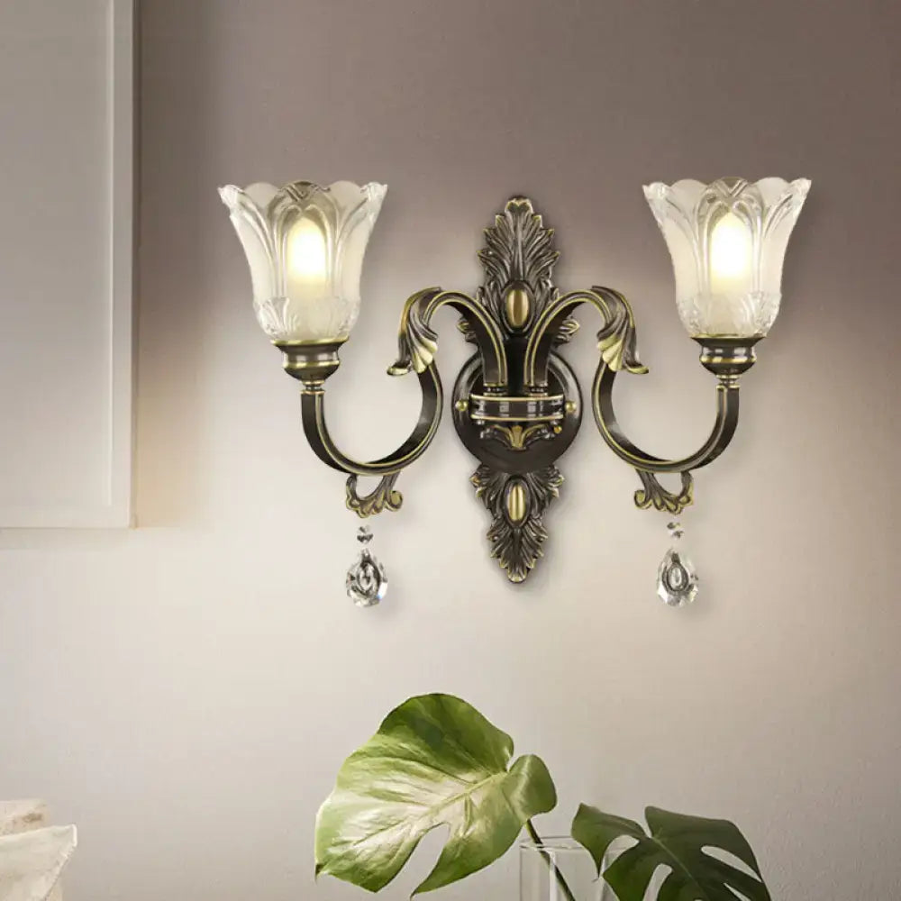 Antique brass floral wall sconce with metal base for bedroom