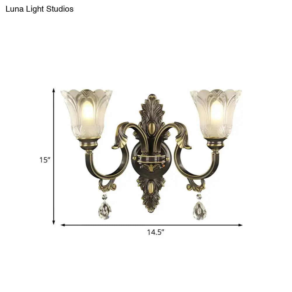 Antique brass floral wall sconce with metal base for bedroom