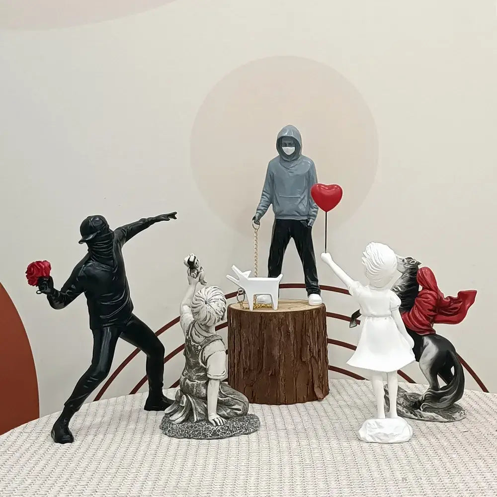 DecorBites™ Banksy Sculpture Collection: Flower Thrower & Balloon Girl Figurines for Home & Office