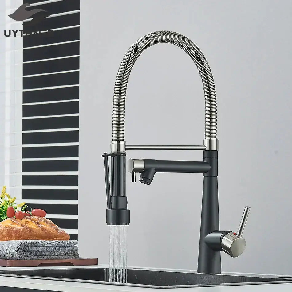 Black and stainless steel kitchen faucet with flexible spout