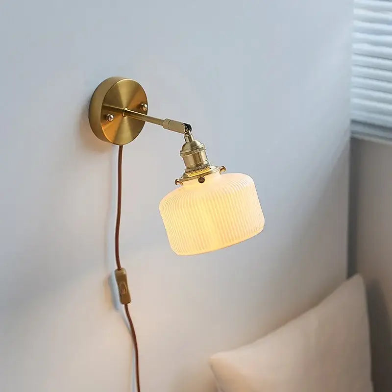 Brass ribbed decorbites ceramic wall sconce with iron arm bedroom light
