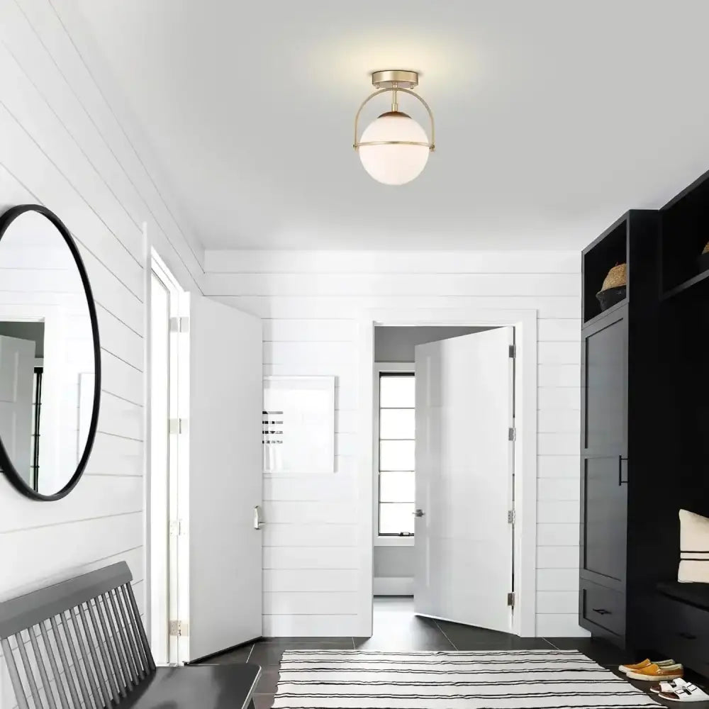 Brushed brass glass ball ceiling light for living room