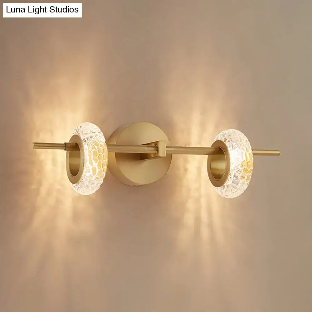 Contemporary brass double oval wall light fixture – bedroom led sconce