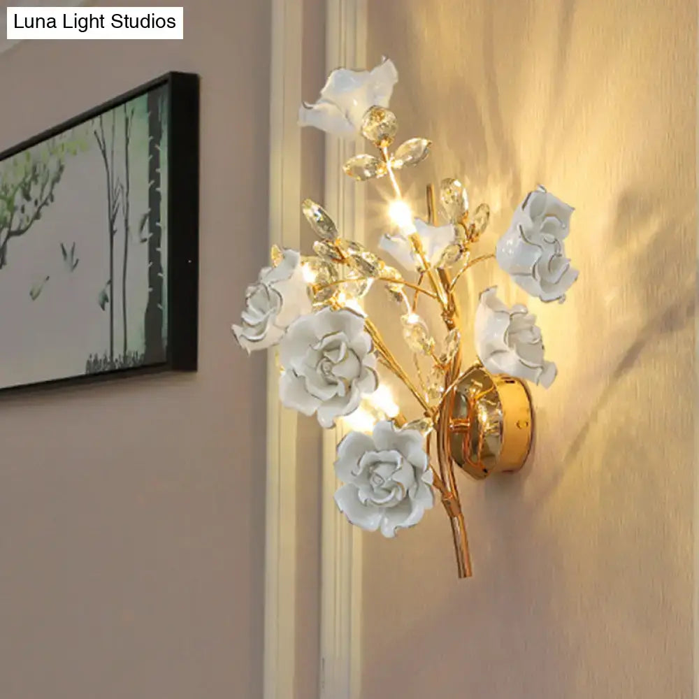 DecorBites™ Contemporary Gold Crystal Wall Lamp with Teardrop Faceted Design and Ceramic Flower Accents - 3 Bulb Wall Light Fixture