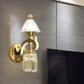 Contemporary gold wall light with clear crystal – bedroom sconce