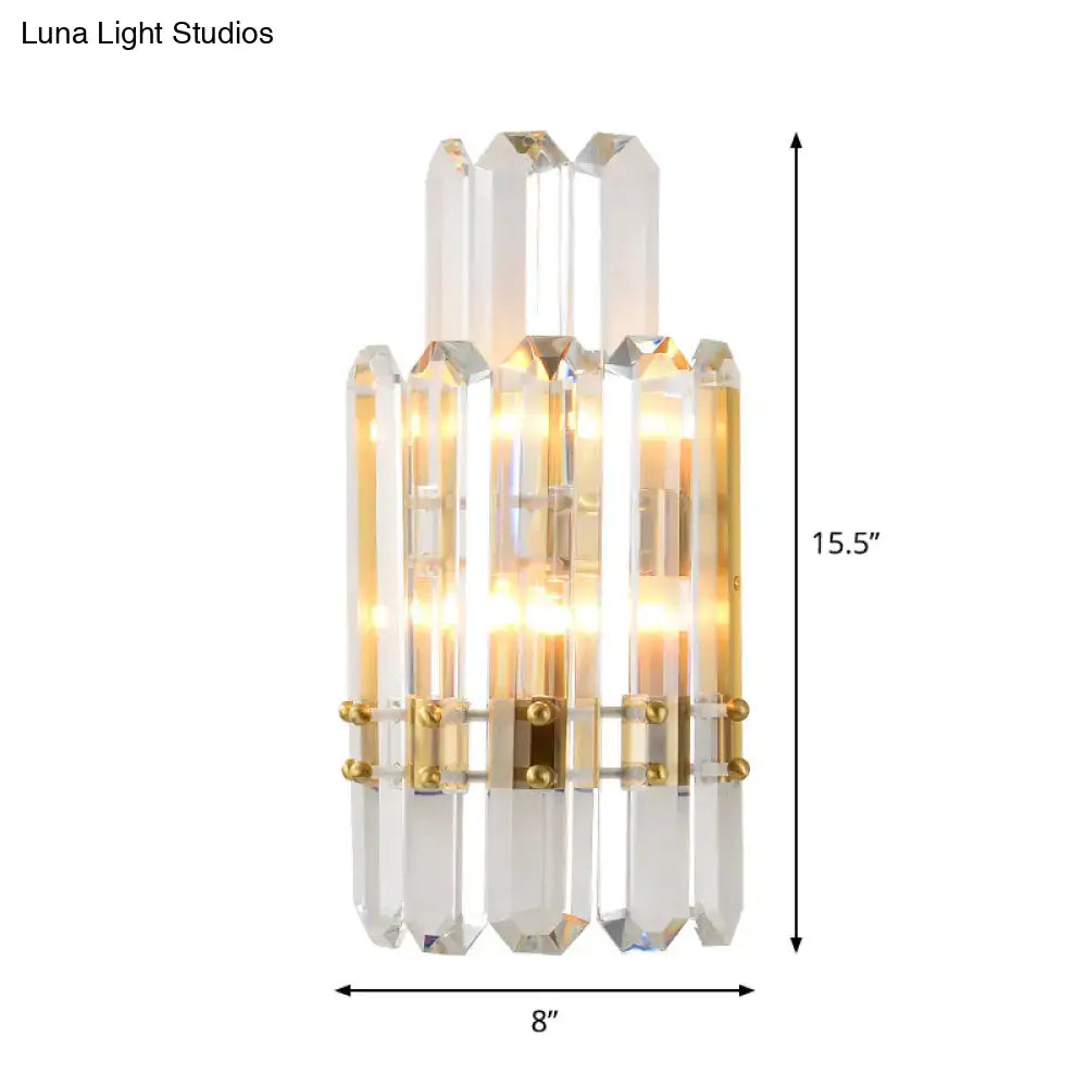 Contemporary gold wall sconce with clear crystal prisms for dining room