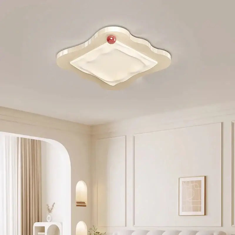 Cream cloud led ceiling light with red accent bedroom decor