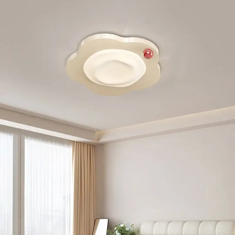 Cream cloud led ceiling light with red accent bedroom decor