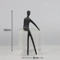 Minimalist black & gold abstract character sculpture living room decor