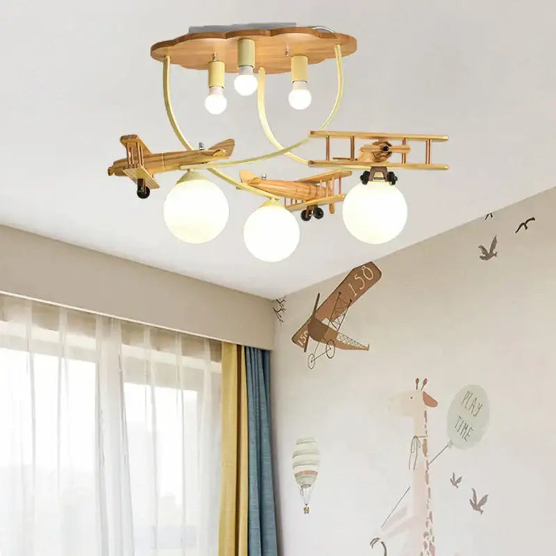 Wooden airplane chandelier light with cloud base for nursery room