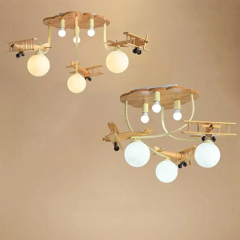 Wooden airplane chandelier light with cloud base for nursery room