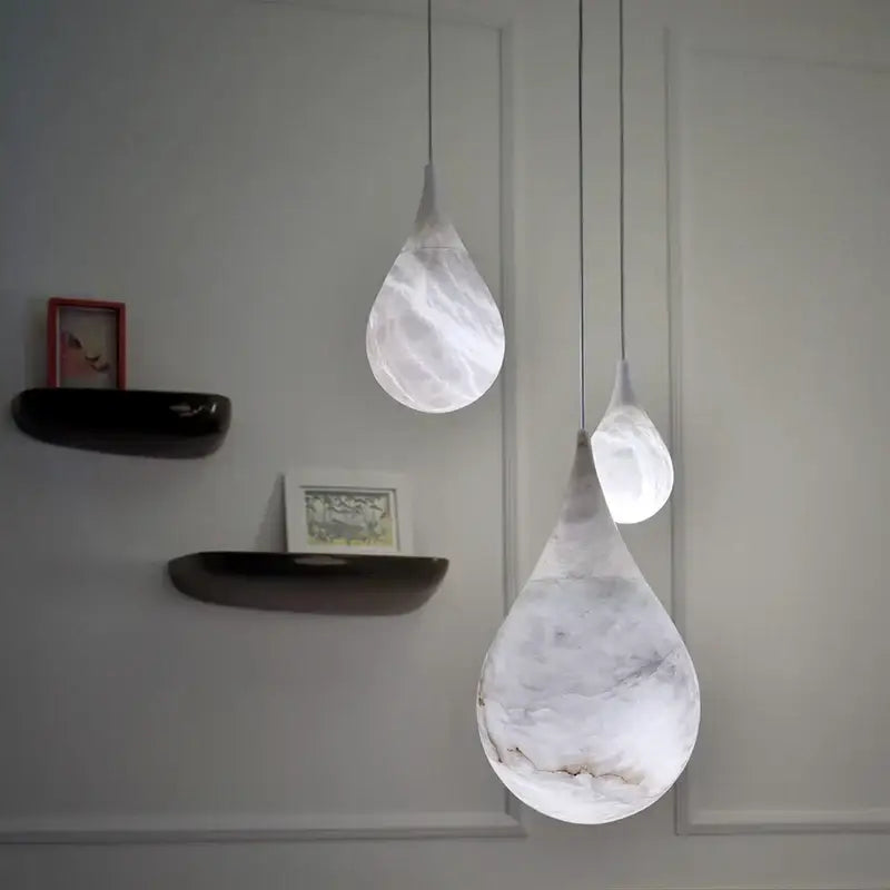 Modern gold and white marble pendant lights for dining room