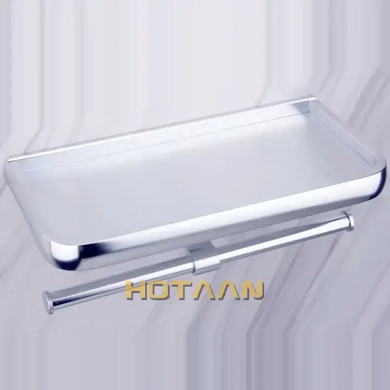 Modern chrome toilet paper holder with bathroom shelf
