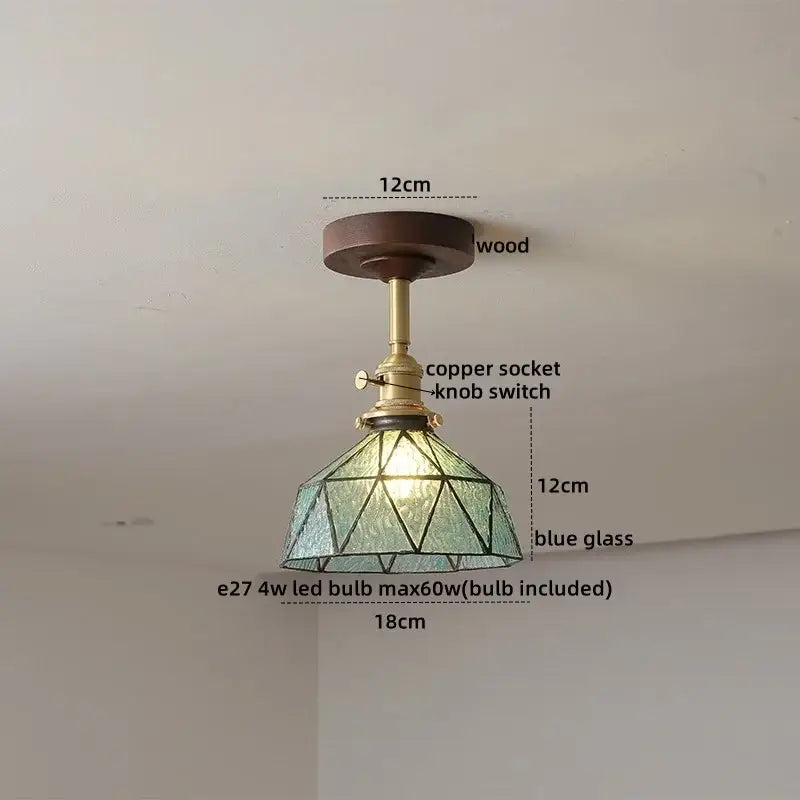 Modern amber glass and copper ceiling light fixture dining room