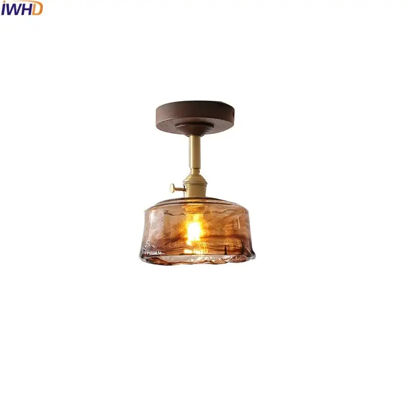 Modern amber glass and copper ceiling light fixture dining room