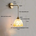 Antique brass and amber glass led wall sconce for bedroom