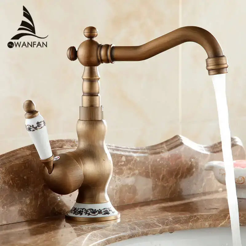 Antique brass and white ceramic bathroom sink faucet swivel spout