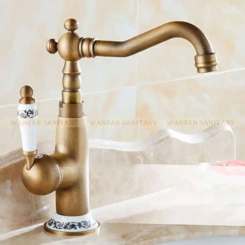 Antique brass and white ceramic bathroom sink faucet swivel spout