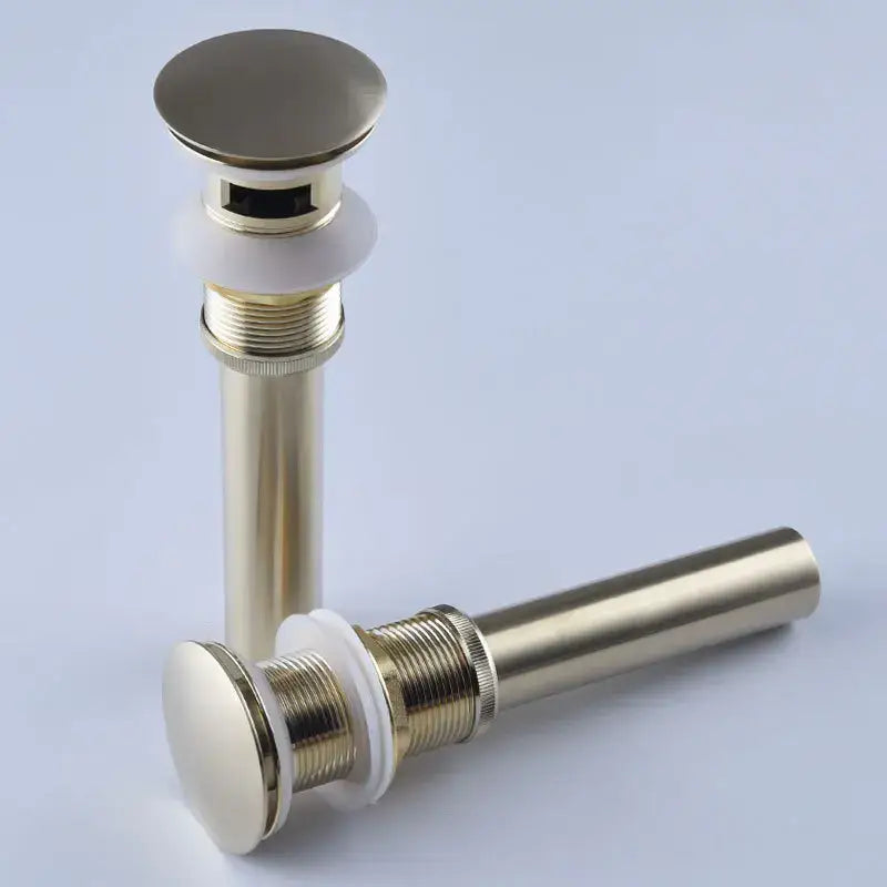 Modern antique brass bathroom sink drain kit with white seals