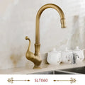 Antique brass swivel spout kitchen faucet with floral ceramic handle