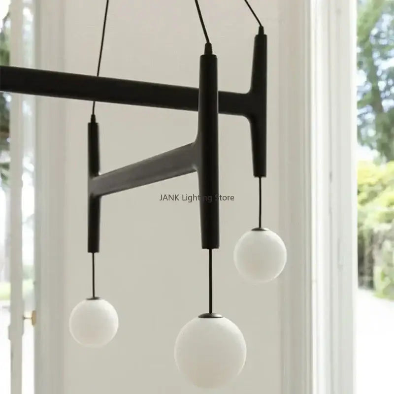Modern astra wood pendant light with white glass shades dining room