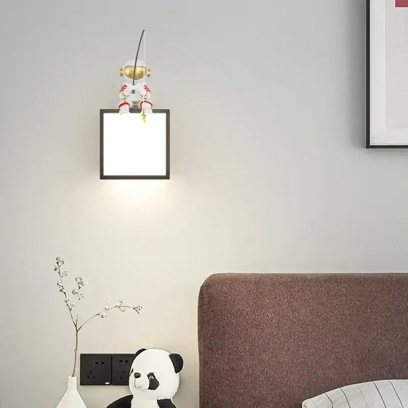 Black astronaut cartoon sconce metal lighting for living room decor