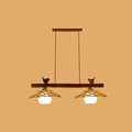 Rustic bamboo pendant with birds and white glass globe dining room