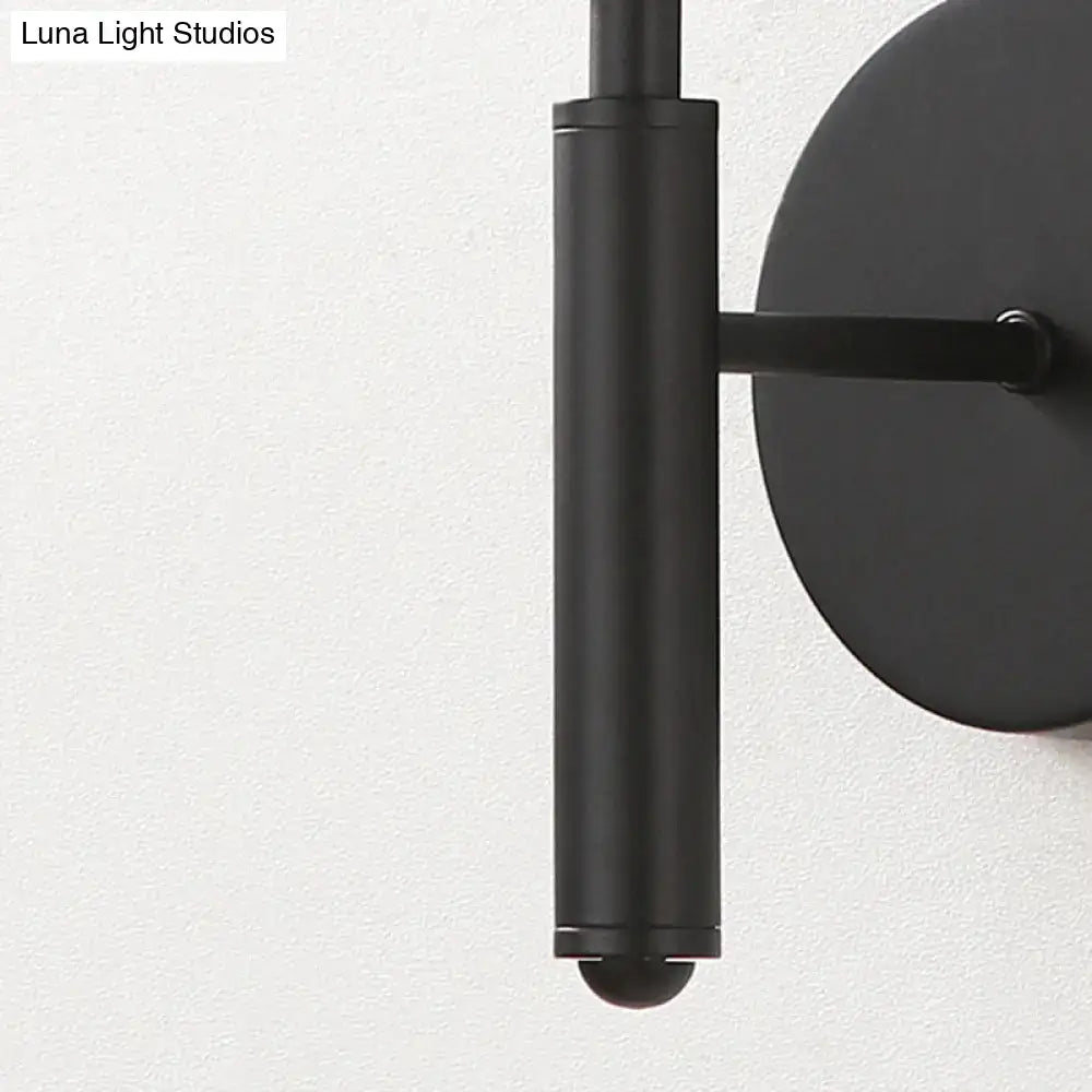 Modern black wall sconce with clear textured glass – bedroom light