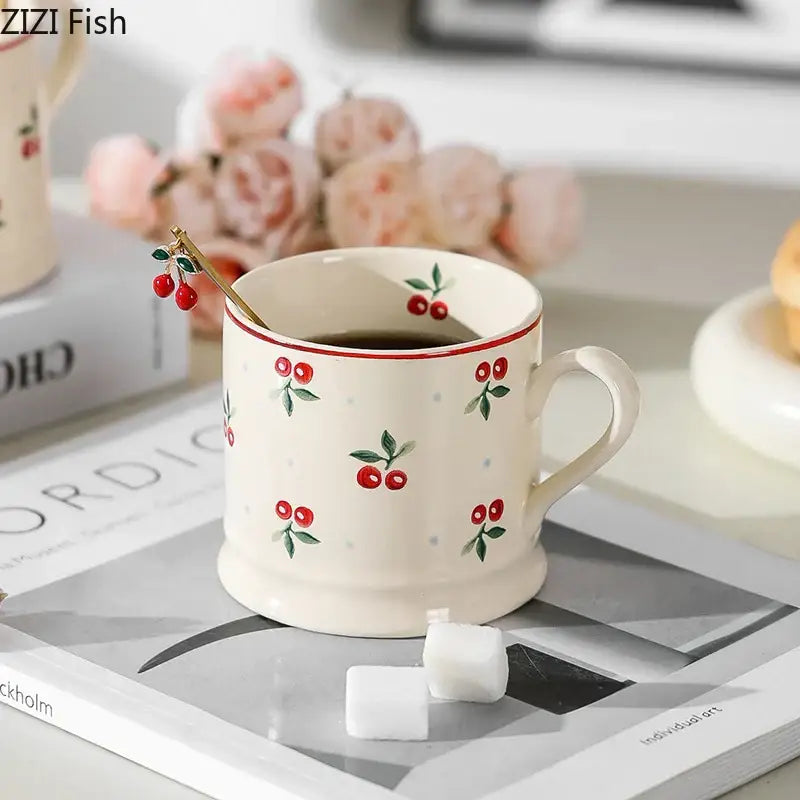 Cream cherry porcelain coffee mug with gold spoon – dining room tableware