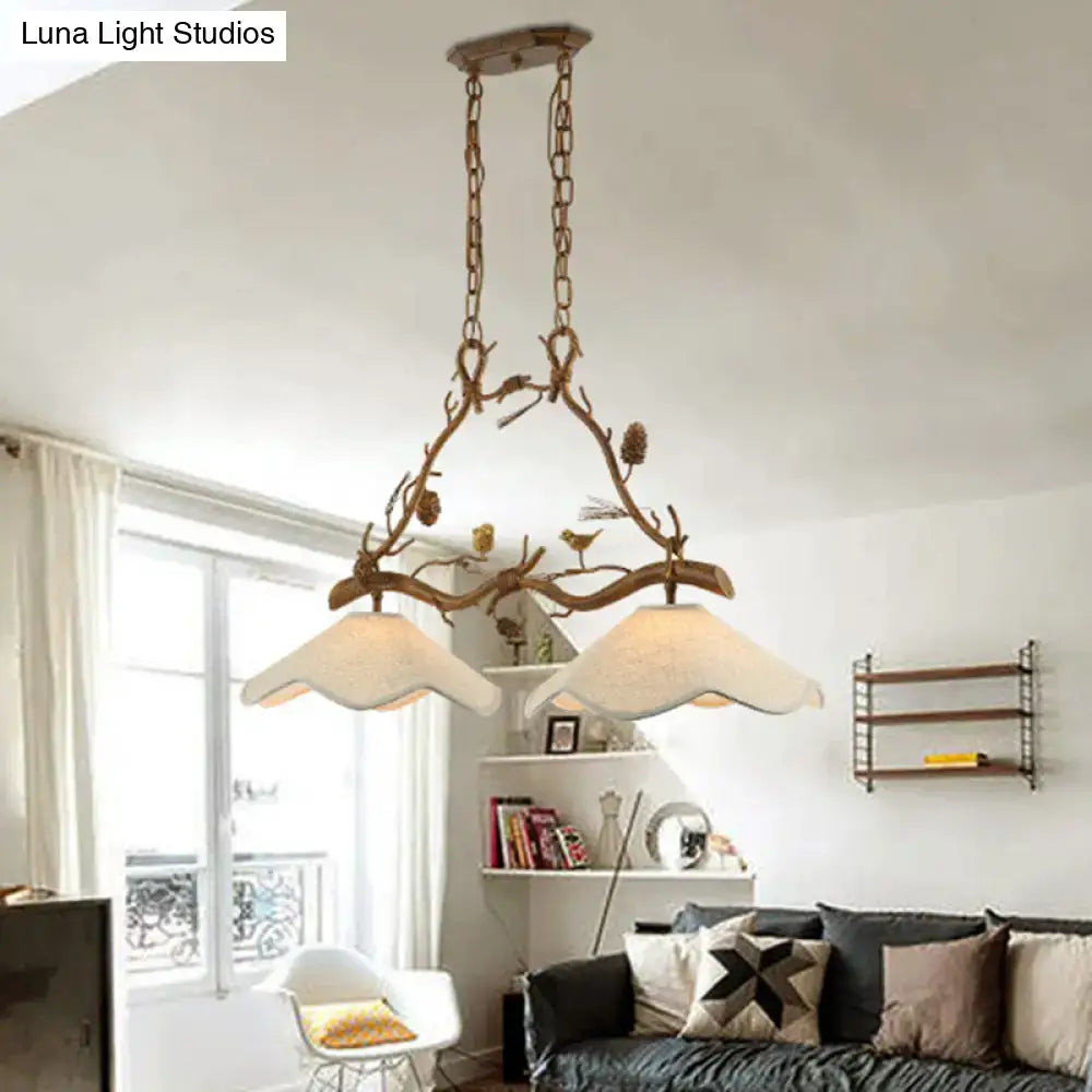Rustic bronze branch suspension light dining room with bird accents