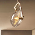 Modern brass and clear glass fish pendant light dining room