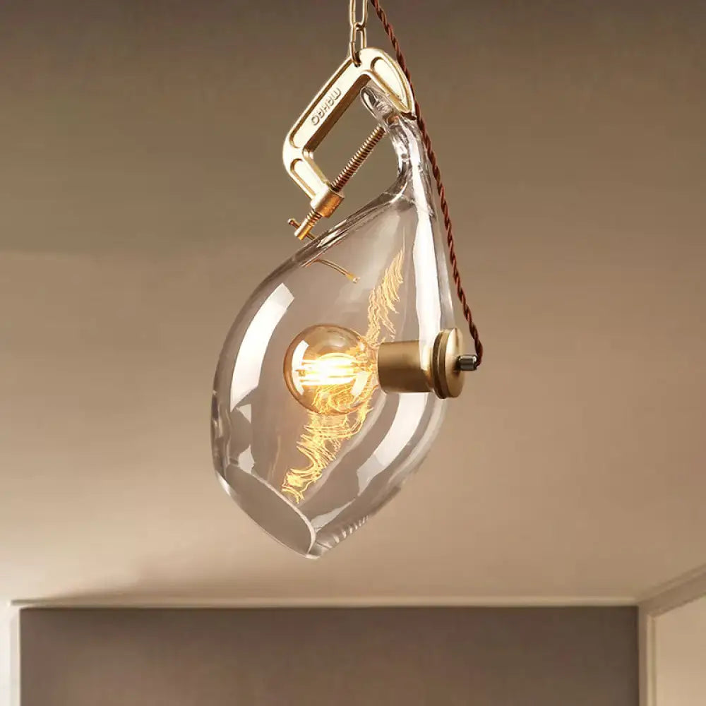 Modern brass and clear glass fish pendant light dining room