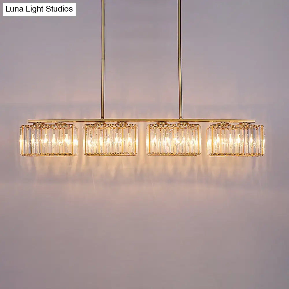 Modern gold linear chandelier with clear cuboid crystal dining room