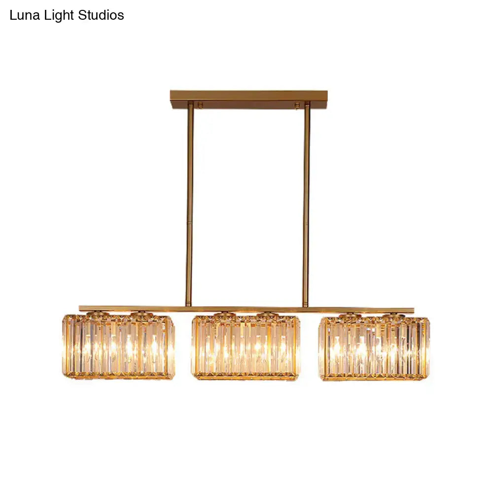 Modern gold linear chandelier with clear cuboid crystal dining room
