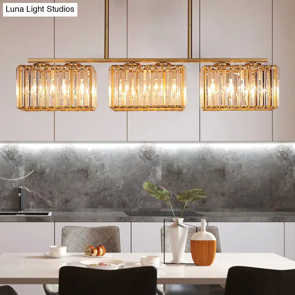 Modern gold linear chandelier with clear cuboid crystal dining room