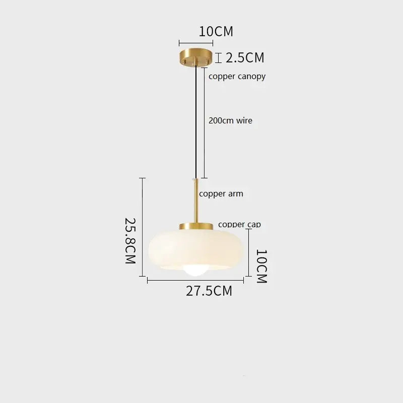 Sleek amber glass and copper pendant light for kitchens