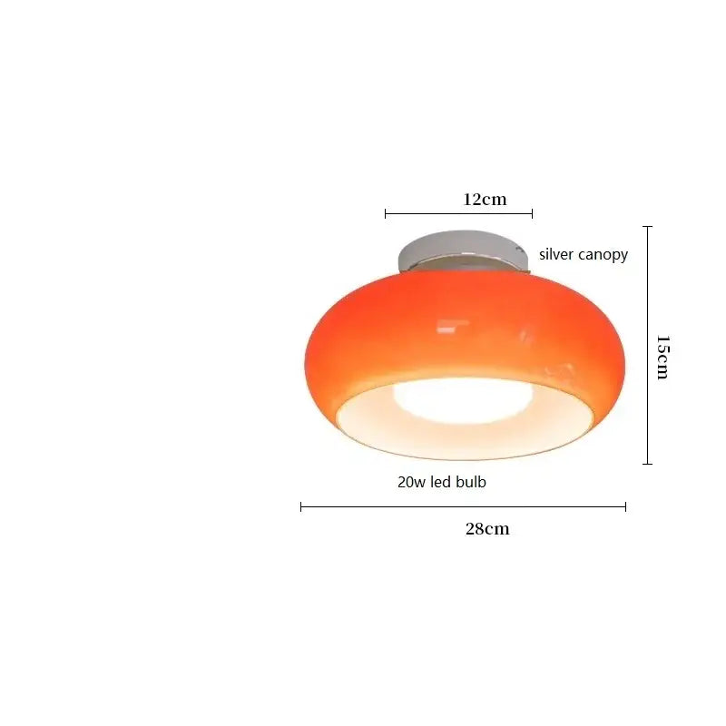 Sleek amber glass and copper pendant light for kitchens