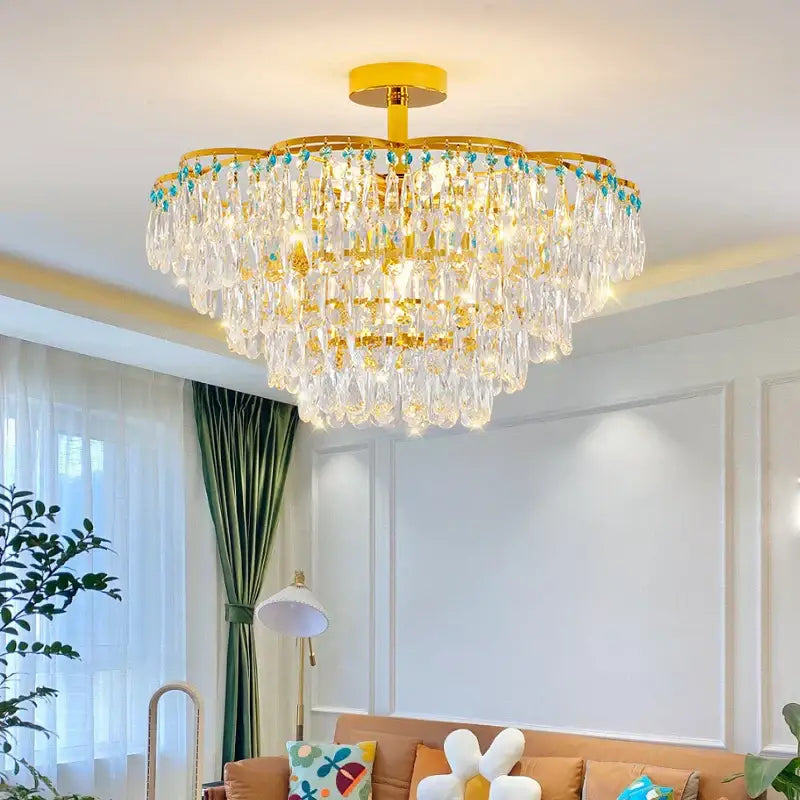 Post-modern gold and turquoise crystal light chandelier dining room