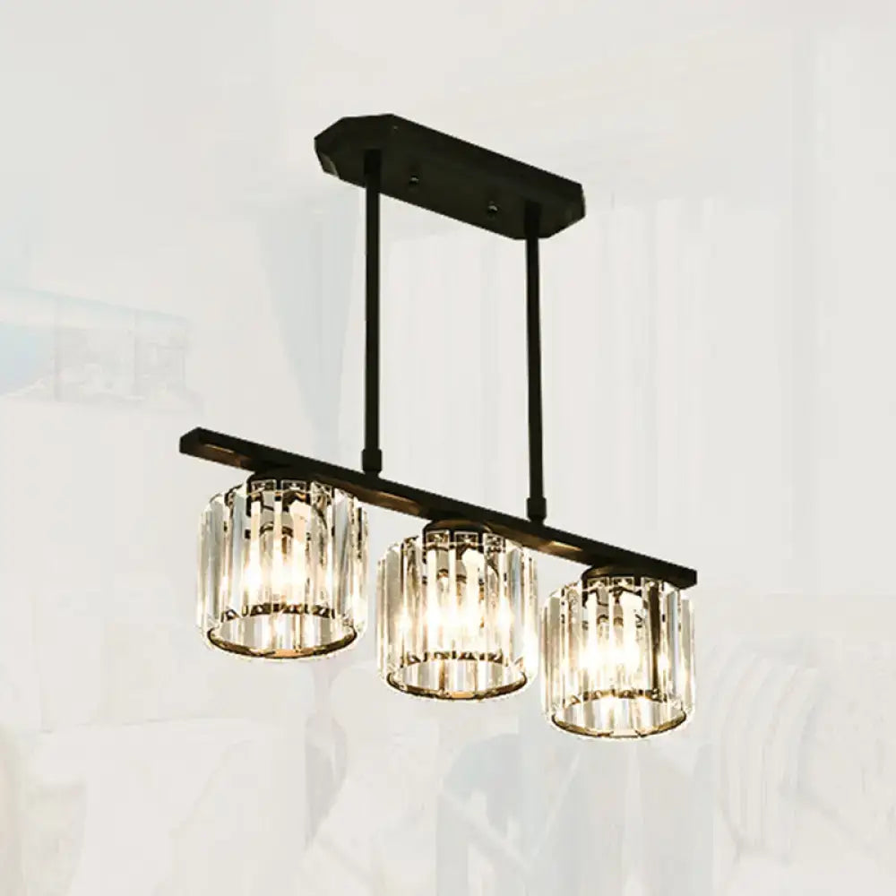Simple black metal chandelier with three crystal shades dining room