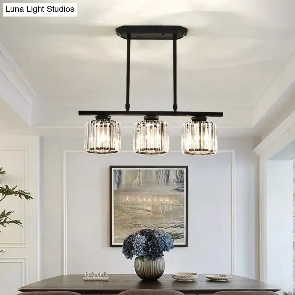 Simple black metal chandelier with three crystal shades dining room
