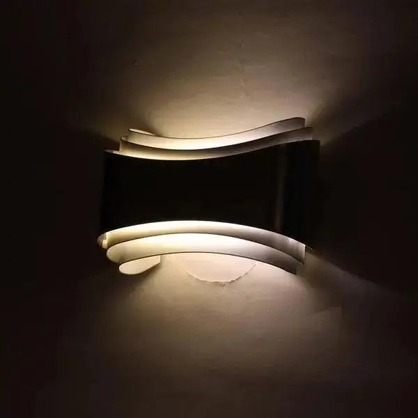 Curved modern wall sconce brushed stainless steel living room light